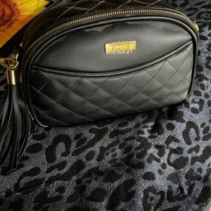 Joy/Iman pocketbook